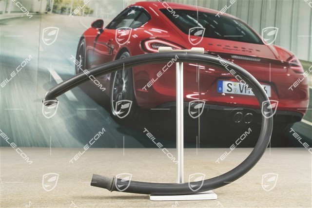 Convertible top compartment water drain hose