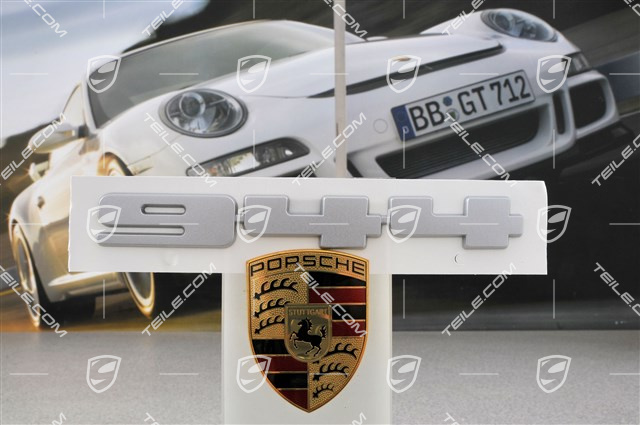 "944" logo, silver "944" logo, silver